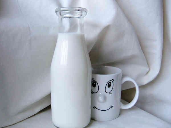 bottle of milk and a smiling glass