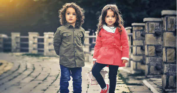 boy and girl standing together