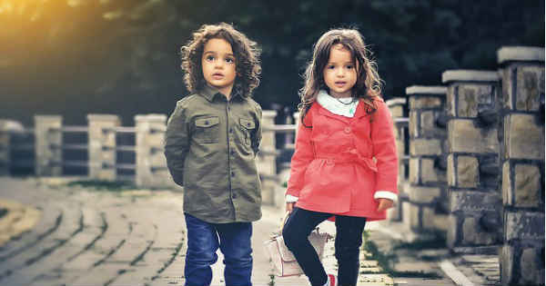 boy and girl standing together