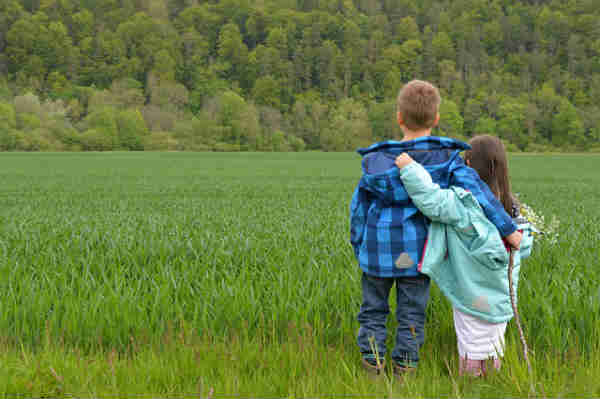 compassionate children huging