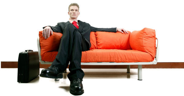 confident man on couch