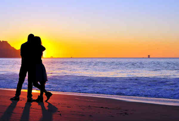 couple recommiting on the beach