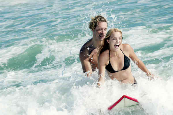 couple waterskiing