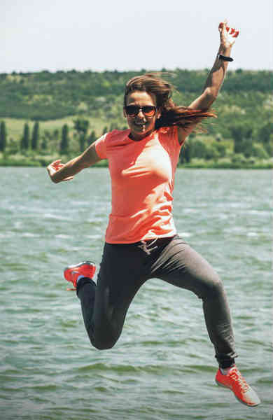 woman jumping in air