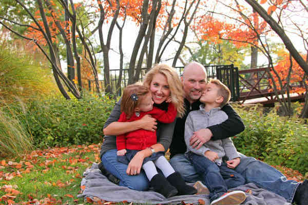 family enjoying a picnic being happy