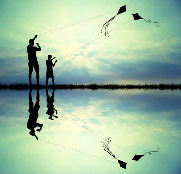 father and son kiting