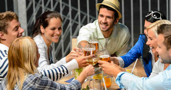 friends having drinks together in relaxing atmosphere