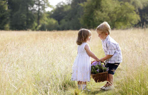 boy and girl helping each other