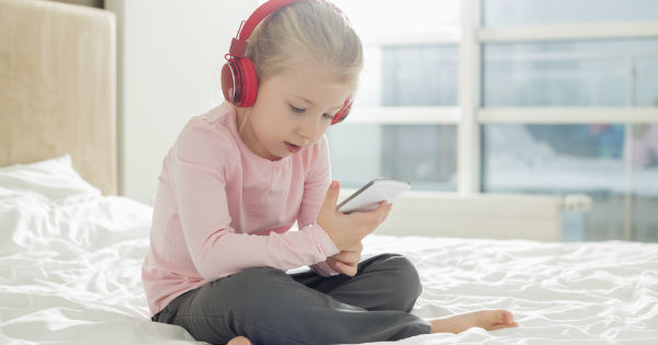 girl listening to headphones