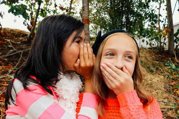 gossiping and laughing friends