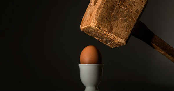 hammer breaking an egg