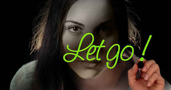 woman writing just let go