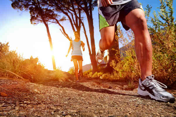 man and woman running together