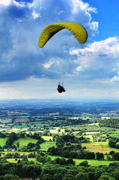 man paragliding