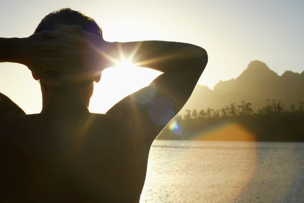 bored man watching the sunset