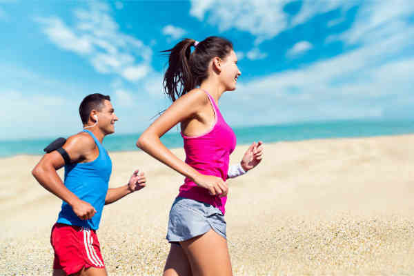 man and woman running together