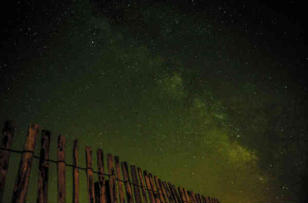 beautiful sky view from behind a fence