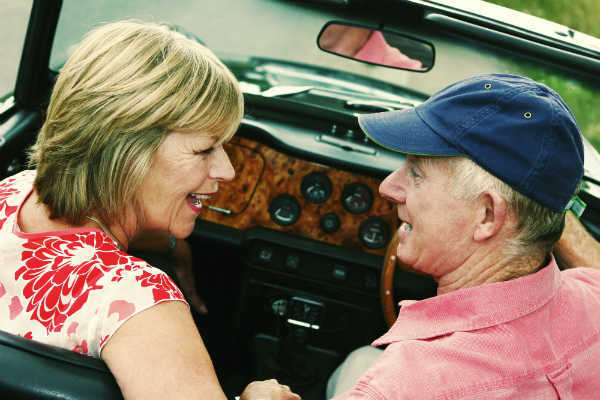 people talking in a car