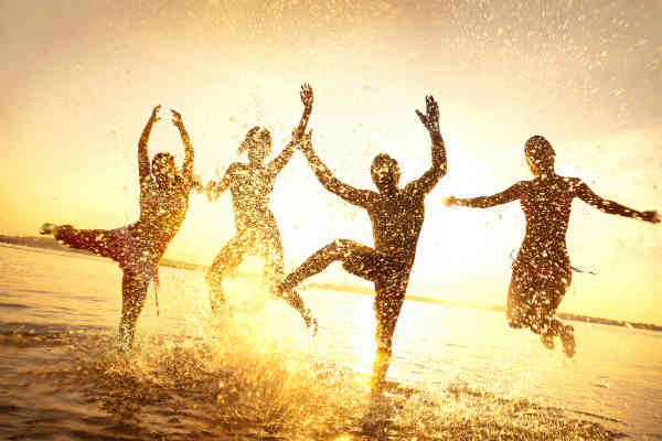 people enjoying themselves in the water