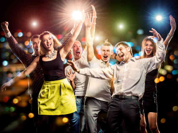 a group of friends partying to music