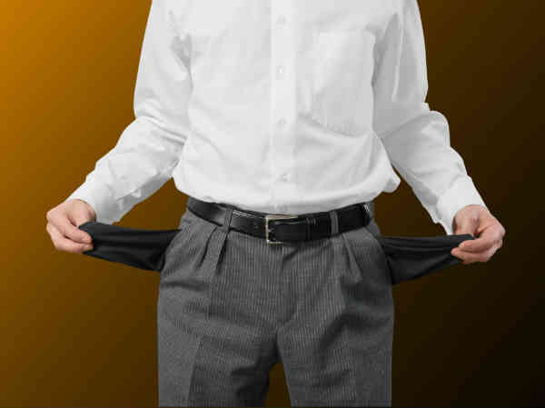 poor businessman with empty pockets
