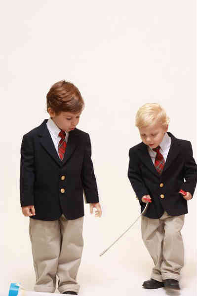 smartly dressed boys playing