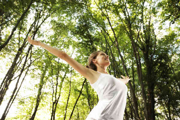 woman breathing fresh air