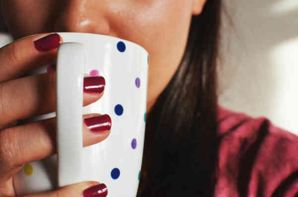 woman drinking coffe in the morning
