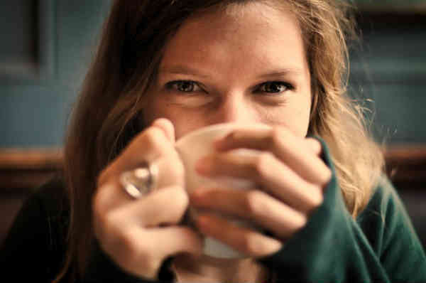 woman drinking coffee