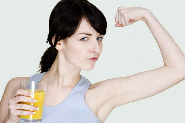 woman flexing her muscles