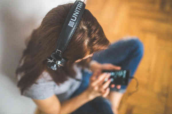 woman listening to music intently