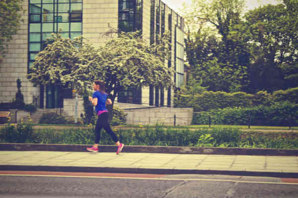 woman jogging in neighborhood