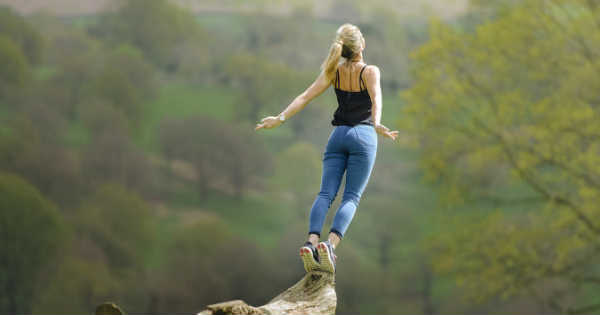 woman jumping from comfort zone