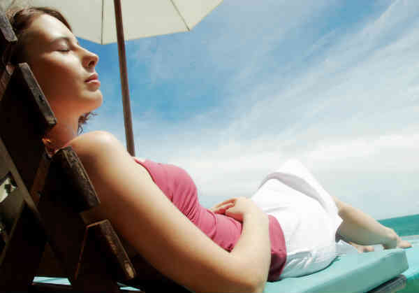 woman enjoying a break on the beach