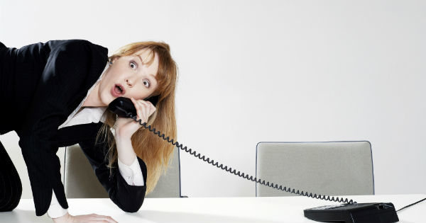 woman listening actively on the telephone