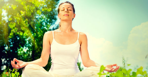 woman connecting with herself in nature