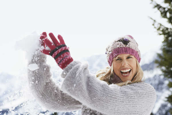 woman loving the snow