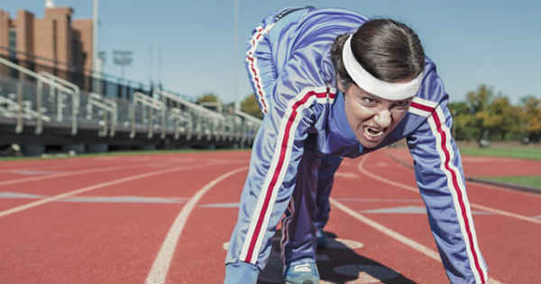 woman running a race