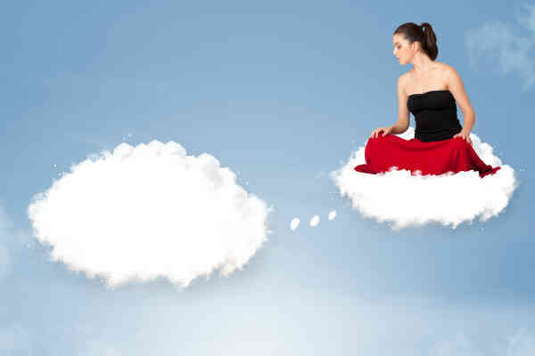 woman sitting on top of a cloud