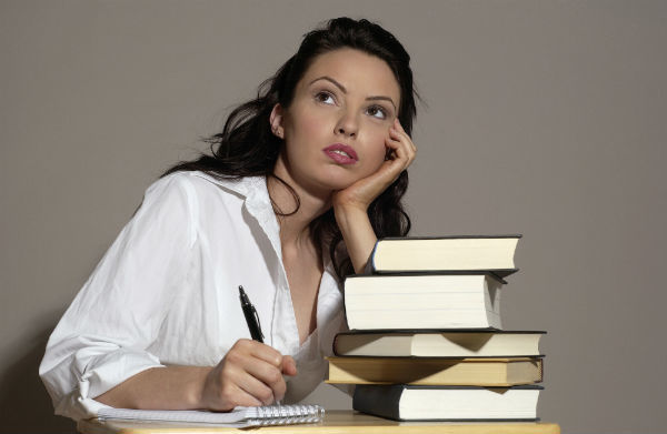 smart woman thinking about a topic to write on next