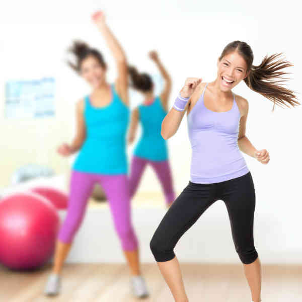 women enjoying aerobics class