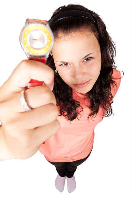 woman warning about delay with watch